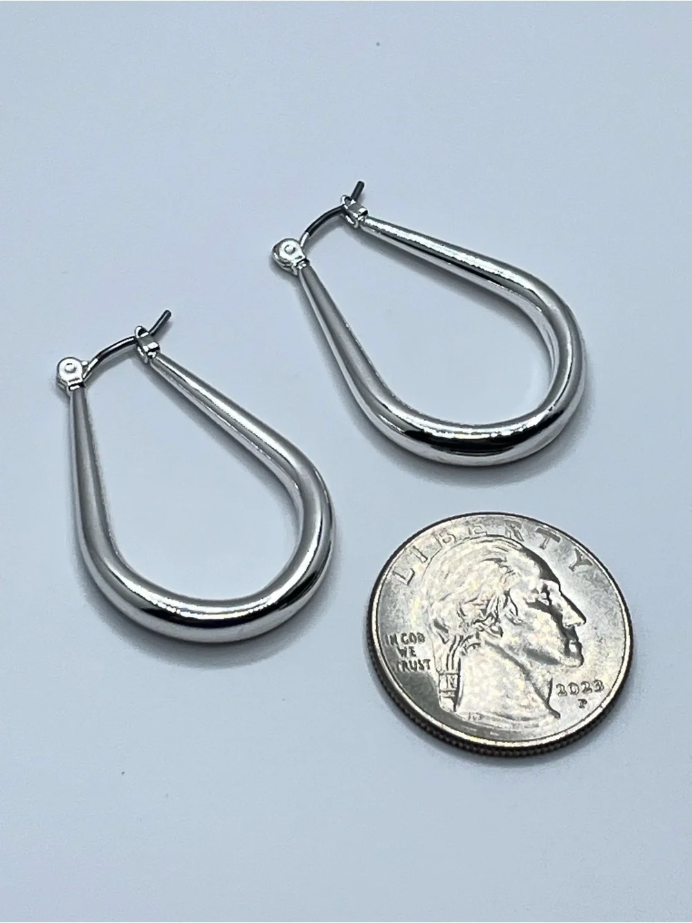 Silver Tone Teardrop Hoop Earrings Sleek Minimalist Statement Hoops